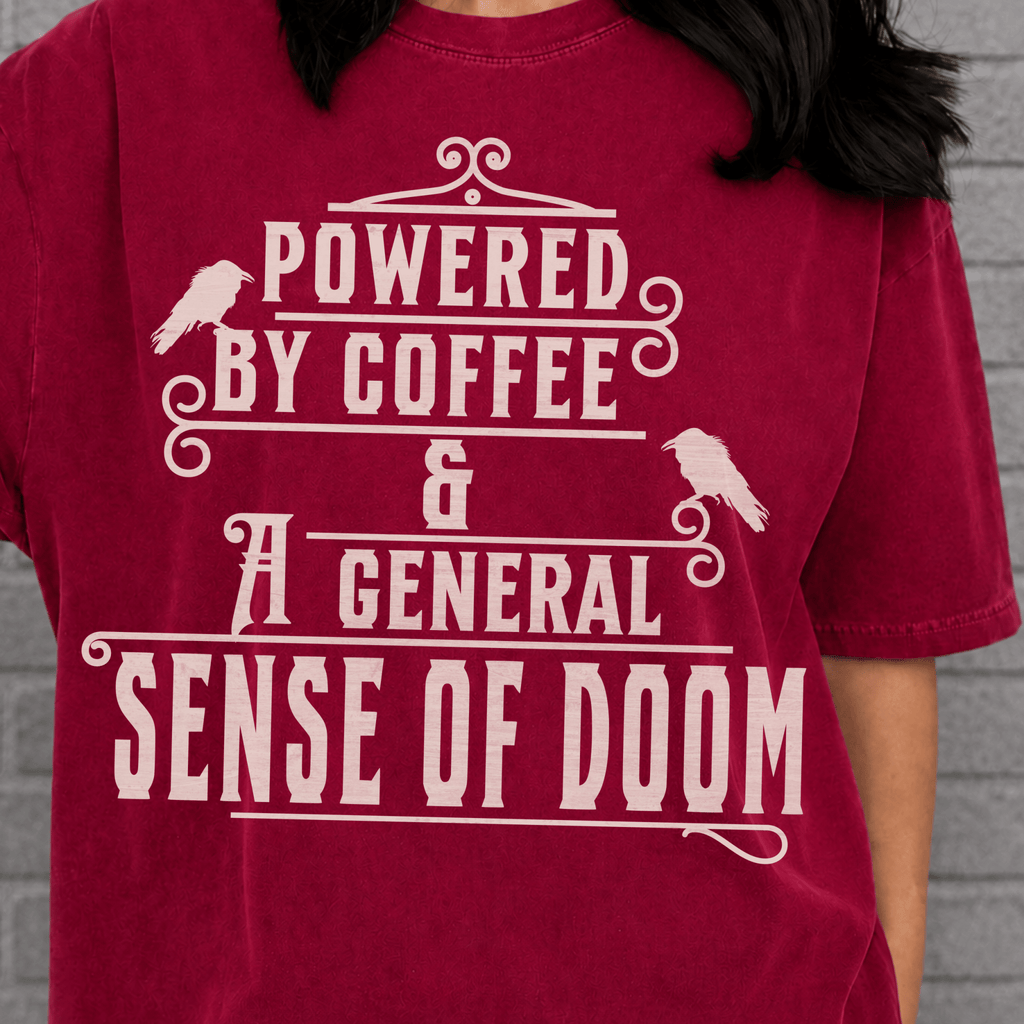 Powered By Coffee and Doom Shirt, Funny Goth Coffee Tee, Dark Humor Coffee Lover Gift, Sarcastic Coffee Shirt, Existential Dread Tee - Deadpan Outdoors Co.