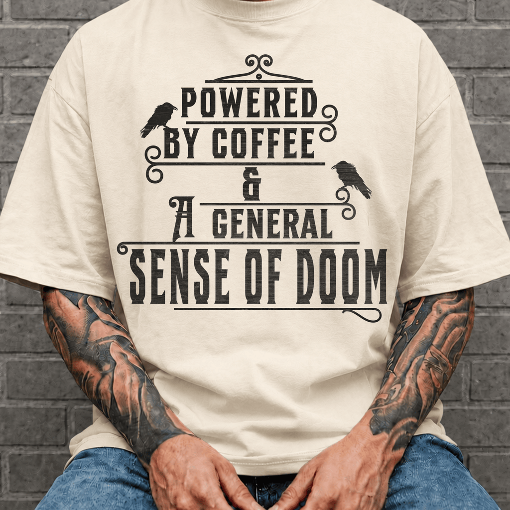 Powered By Coffee and Doom Shirt, Funny Goth Coffee Tee, Dark Humor Coffee Lover Gift, Sarcastic Coffee Shirt, Existential Dread Tee - Deadpan Outdoors Co.
