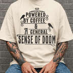 Powered By Coffee and Doom Shirt, Funny Goth Coffee Tee, Dark Humor Coffee Lover Gift, Sarcastic Coffee Shirt, Existential Dread Tee - Deadpan Outdoors Co.