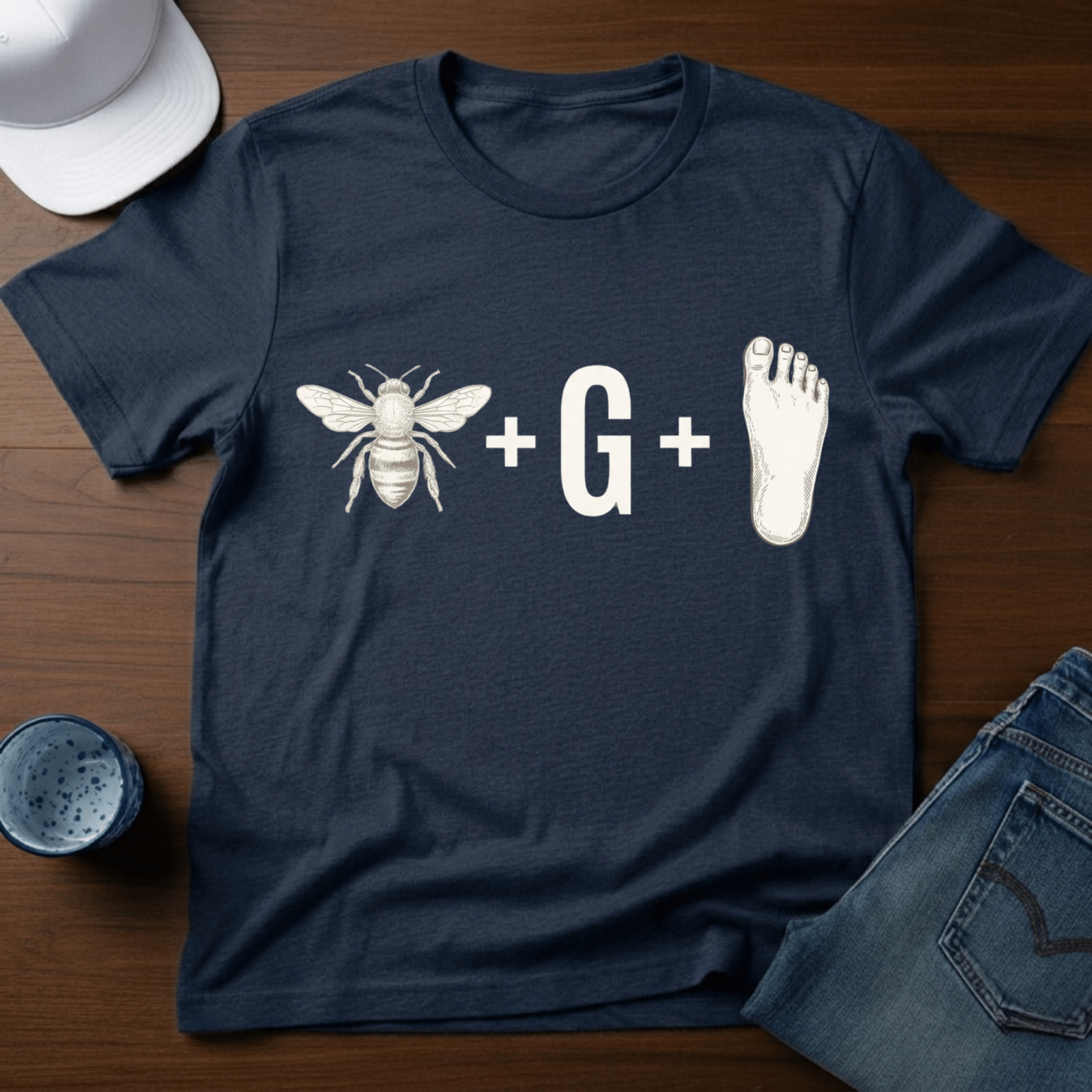 Bee + G + Foot - Bigfoot Rebus Puzzle T-Shirt - Deadpan Outdoors Co.