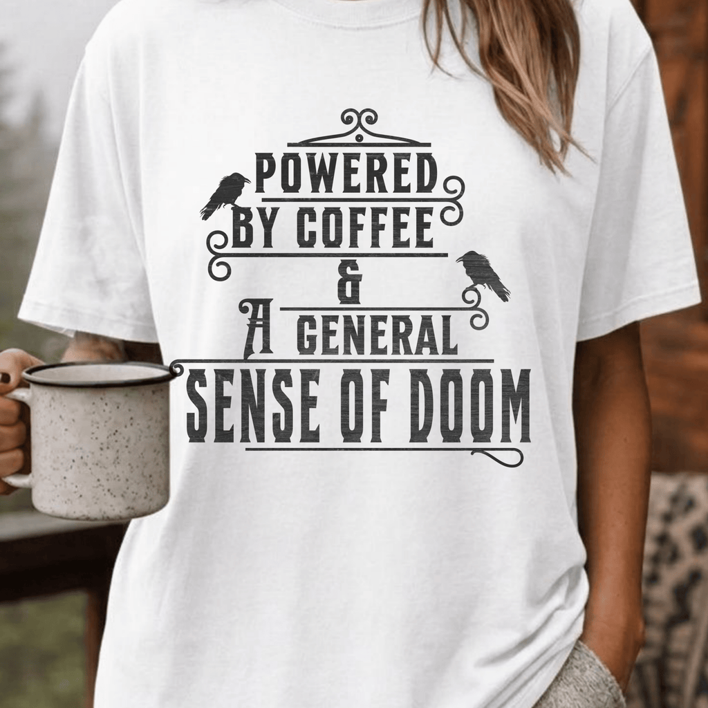 Powered By Coffee and Doom Shirt, Funny Goth Coffee Tee, Dark Humor Coffee Lover Gift, Sarcastic Coffee Shirt, Existential Dread Tee - Deadpan Outdoors Co.